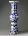 A large Chinese Ming-style blue and white 'mythical beasts' gu vase