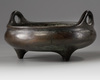 A Chinese bronze tripod censer