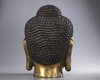 A large Chinese gilt bronze buddha head