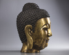 A large Chinese gilt bronze buddha head