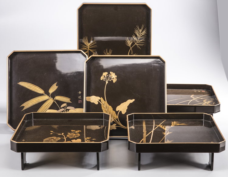 A original set of six lacquered trays in their original box