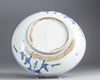 A Chinese blue and white Kraak porcelain 'twin peacock' charger