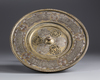 An Islamic silver inlaid brass hand wash bowl