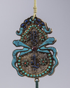 A Chinese stone-inlaid gilt filigree 'abstinence' plaque