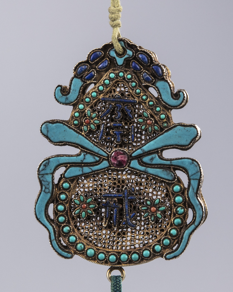 A Chinese stone-inlaid gilt filigree 'abstinence' plaque
