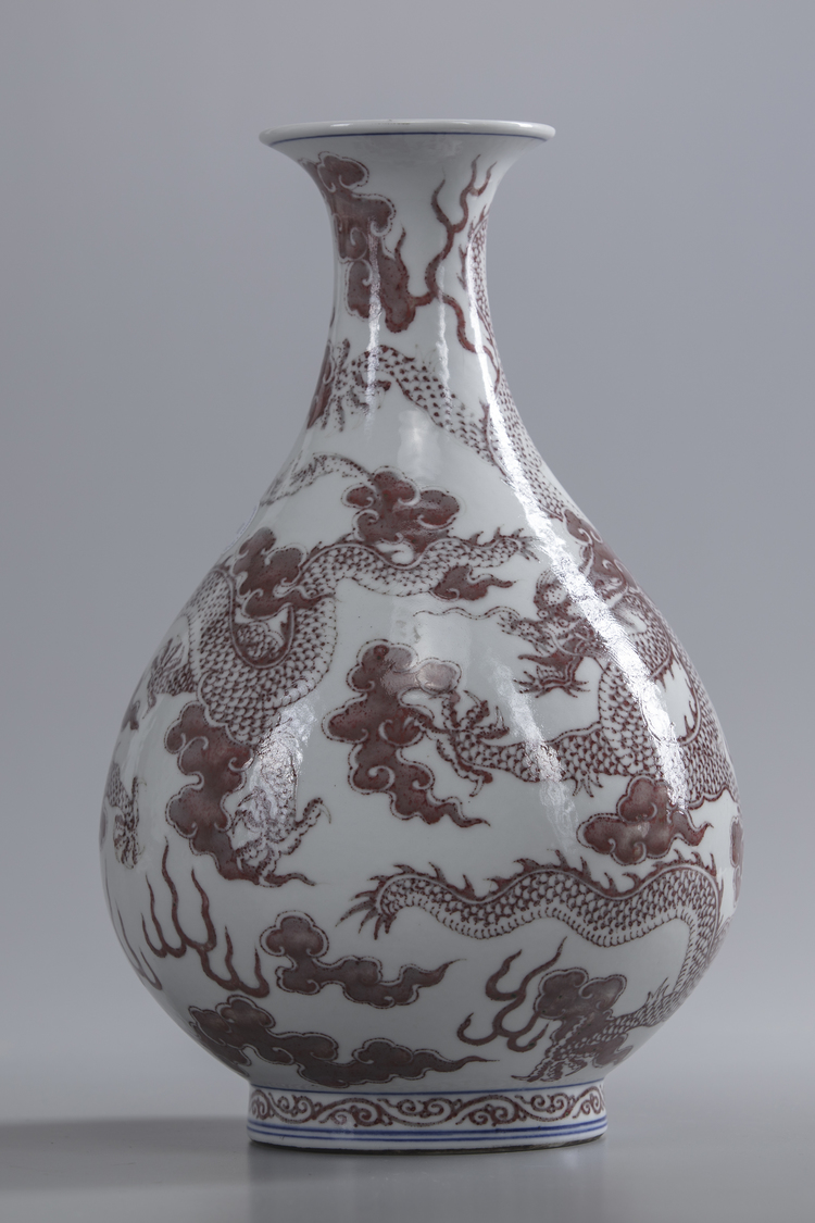 A Chinese blue and white and underglaze copper red 'dragon' pear-shaped vase, yuhuchunping