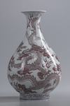 A Chinese blue and white and underglaze copper red 'dragon' pear-shaped vase, yuhuchunping