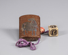 A Japanese Inro with a cubical shaped netsuke