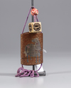 A Japanese Inro with a cubical shaped netsuke