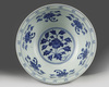 A rare Chinese blue and white 'lotus scroll' bowl