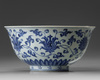A rare Chinese blue and white 'lotus scroll' bowl