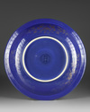 A large Chinese gilt-decorated powder blue-ground 'dragon' charger