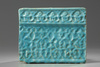 An Islamic kashan turquoise glazed tile