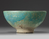 An Islamic turquoise glazed bowl