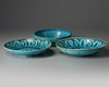 Two Islamic turquoise glazed dishes and a bowl.