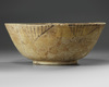 A large Islamic pottery bowl