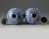 A pair of silver-mounted Chinese blue and white ovoid vases and covers