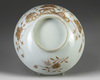 A Chinese iron-red and gilt-decorated moulded bowl