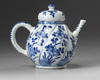 A Chinese blue and white moulded teapot and a hexagonal jar