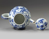 A Chinese blue and white moulded teapot and a hexagonal jar
