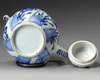 A Chinese blue and white moulded teapot and a hexagonal jar