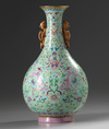 A Chinese turquoise-ground famille rose 'dragon and phoenix' vase