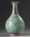 A Chinese turquoise-ground famille rose 'dragon and phoenix' vase