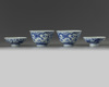 A PAIR OF CHINESE BLUE AND WHITE 'DRAGON' BOWLS AND COVERS,QING DYNASTY (1644-1911)