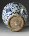 A Chinese Ming-style blue and white 'scrolling peony' meiping