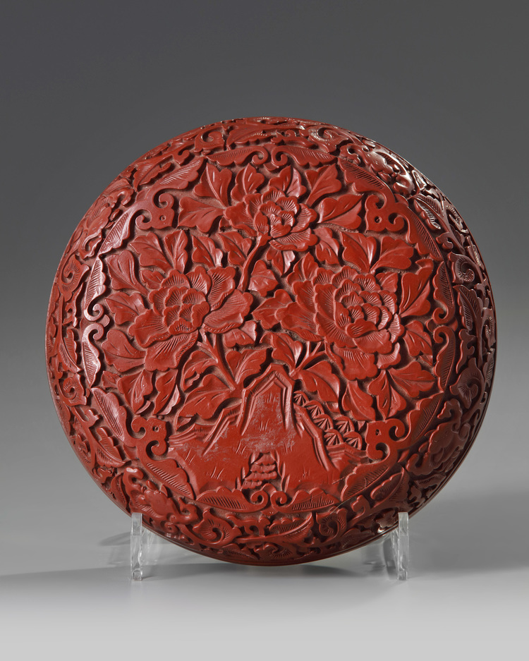 A CHINESE RED-LACQUERED 'PEONIES' BOX AND COVER, 19TH-20TH CENTURY