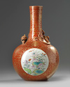 A Chinese iron-red-ground gilt-decorated famille rose bottle vase