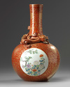 A Chinese iron-red-ground gilt-decorated famille rose bottle vase