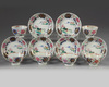 Six sets of Chinese famille rose cups and saucers