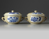 A PAIR OF CHINESE CAFE-AU-LAIT-GROUND BLUE AND WHITE POTICHES AND COVER, KANGXI PERIOD (1662-1722)