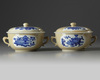 A PAIR OF CHINESE CAFE-AU-LAIT-GROUND BLUE AND WHITE POTICHES AND COVER, KANGXI PERIOD (1662-1722)