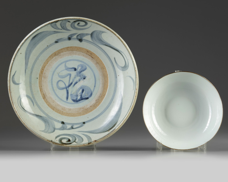 A Chinese Zhangzhou Swatow blue and white charger and a famille rose bowl