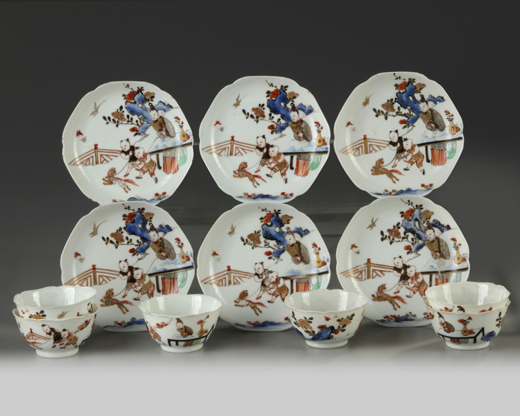 Six Chinese gilt and enamelled foliate cups and saucers