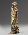 A Chinese soapstone figure of an Immortal