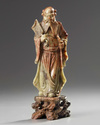 A Chinese soapstone figure of an Immortal