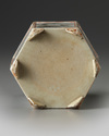 A Chinese hexagonal imitation-marble and en grisaille-decorated hexagonal brush pot, bitong