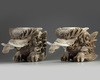 A pair of Japanese carved wood mythical beasts