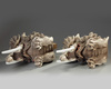 A pair of Japanese carved wood mythical beasts
