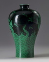 A Chinese black-ground green-enamelled 'twin dragon' meiping