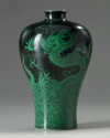 A Chinese black-ground green-enamelled 'twin dragon' meiping
