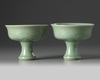 A pair of Chinese celadon-glazed stem cups