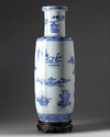 A large Chinese blue and white 'precious objects' rouleau vase