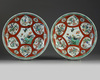 A pair of Chinese coral-ground famille verte chargers