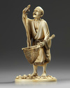 An ivory Japanese figure of a fisherman