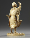 An ivory Japanese figure of a fisherman