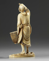 An ivory Japanese figure of a fisherman